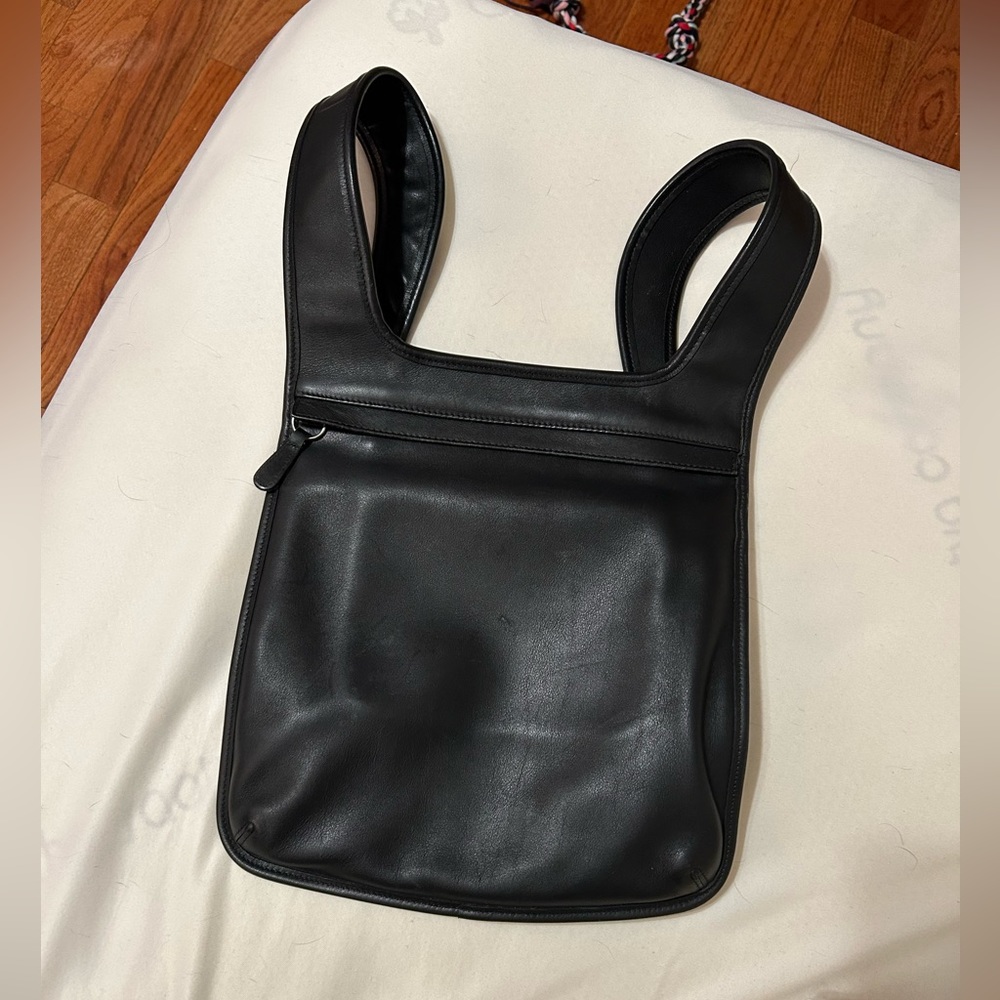 Vintage Black leather Coach backpack.